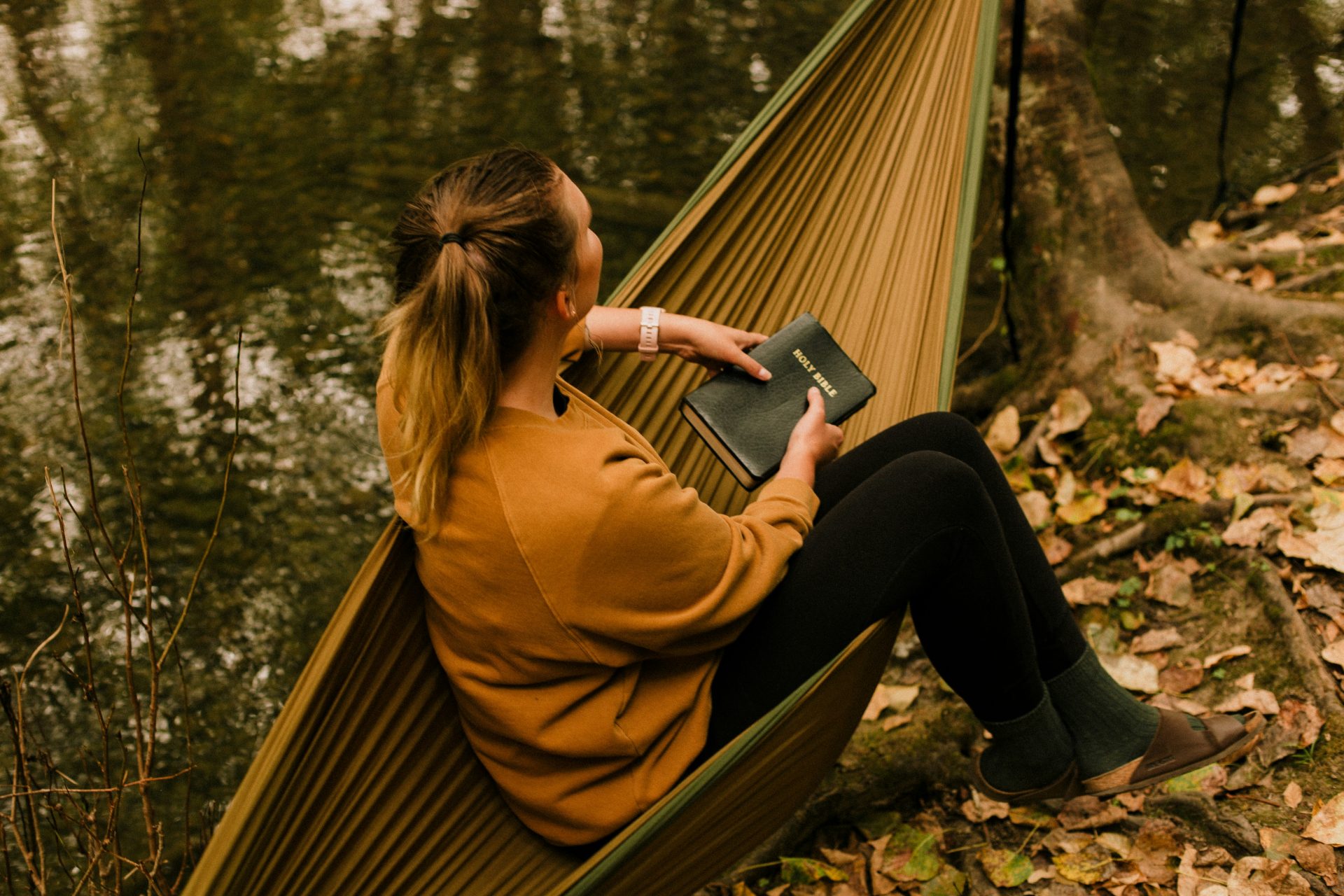 Person reading in a hammock