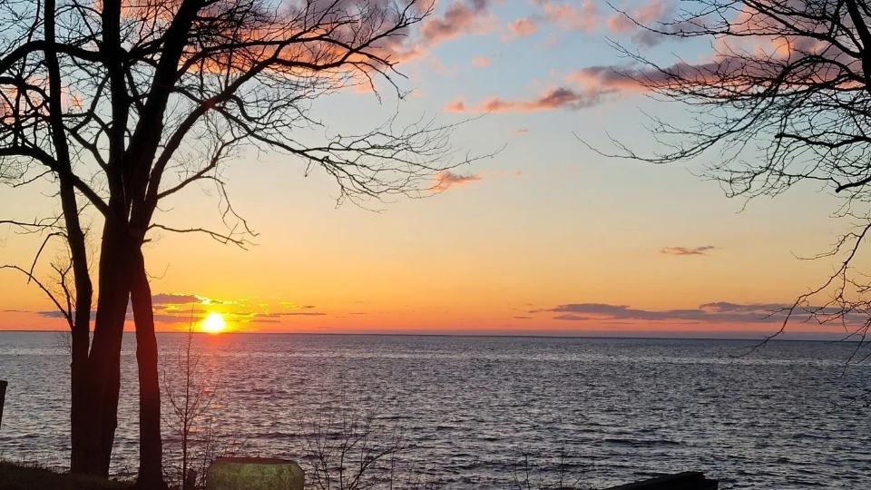 Sunset over calm water